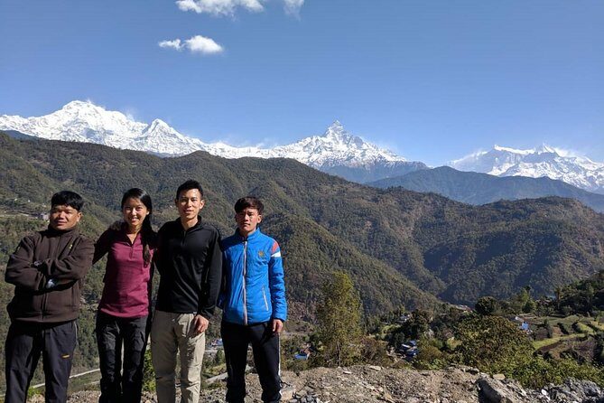 Annapurna base camp trek 5 Days - Day 5 back toward the views: Machhapuchare and Annapurna in morning light