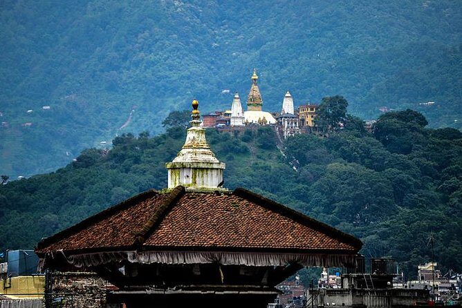 KATHMANDU FULL DAY SIGHTSEEING TOUR (6-hrs) - Stop 4: Boudhanath Stupa—Buddhist cosmos in a huge stone mandala