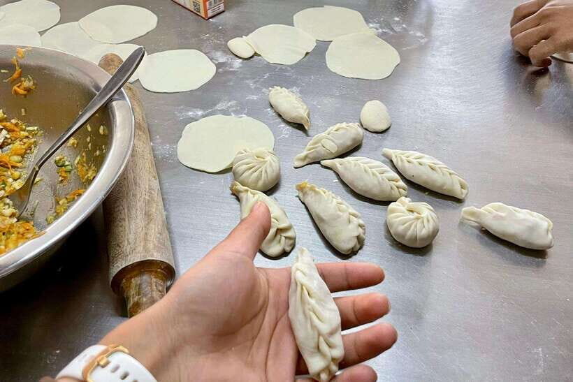 Kathmandu: Local Lead Traditional Momo-Making Class & Pickup - Dough practice and folding technique you can actually repeat