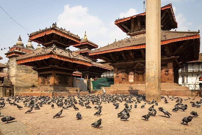 Private Tour of 4 UNESCO Heritage Sites in Kathmandu by Car - Stop 1: Boudhanath Stupa and the feeling of a major Buddhist landmark